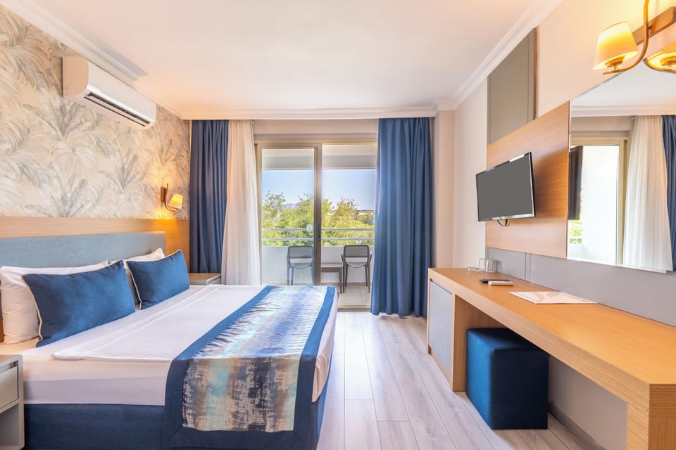 Free minibar items, in-room safe, desk, laptop workspace