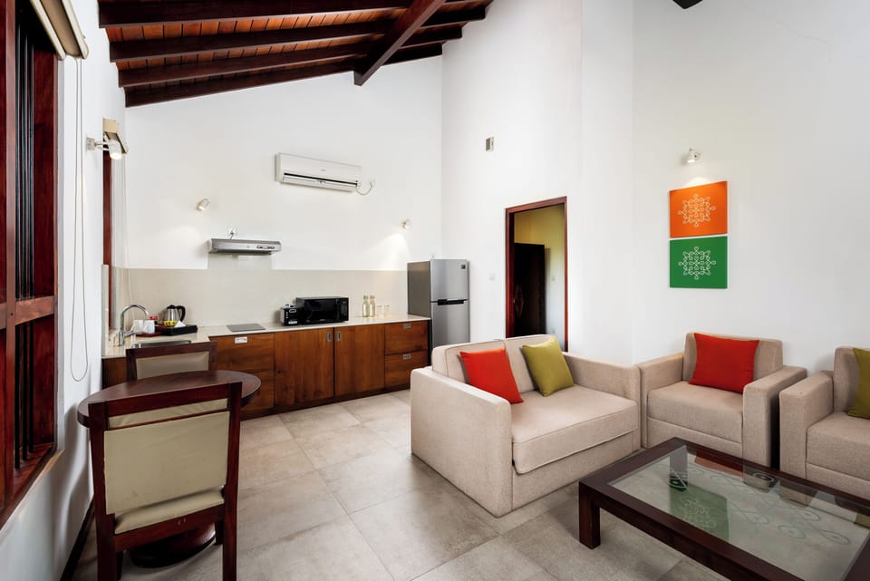 Deluxe Suite, 1 Bedroom, Garden View | Private kitchenette | Fridge, coffee/tea maker, electric kettle, paper towels