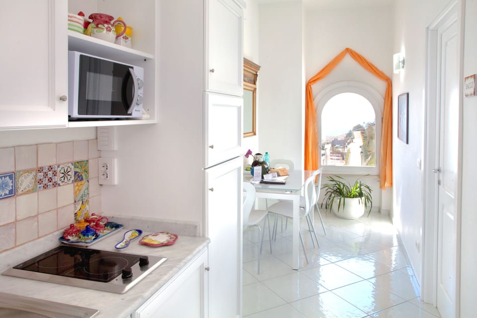Deluxe Apartment, 2 Bedrooms, 2 Bathrooms, Sea View | Private kitchen | Coffee/tea maker, fridge, microwave, stovetop