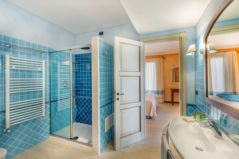 Presidential Suite, Hot Tub, Harbor View (Wellness) | Bathroom | Designer toiletries, hair dryer, bidet, towels