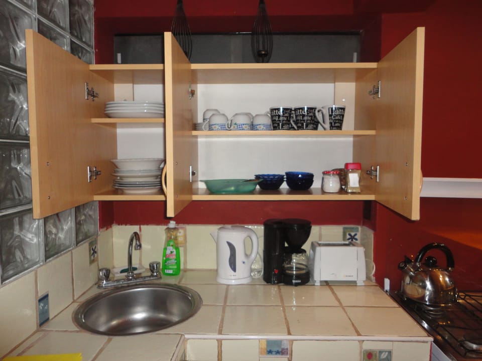 Apartment, 3 Bedrooms | Private kitchenette | Fridge, microwave, oven, stovetop