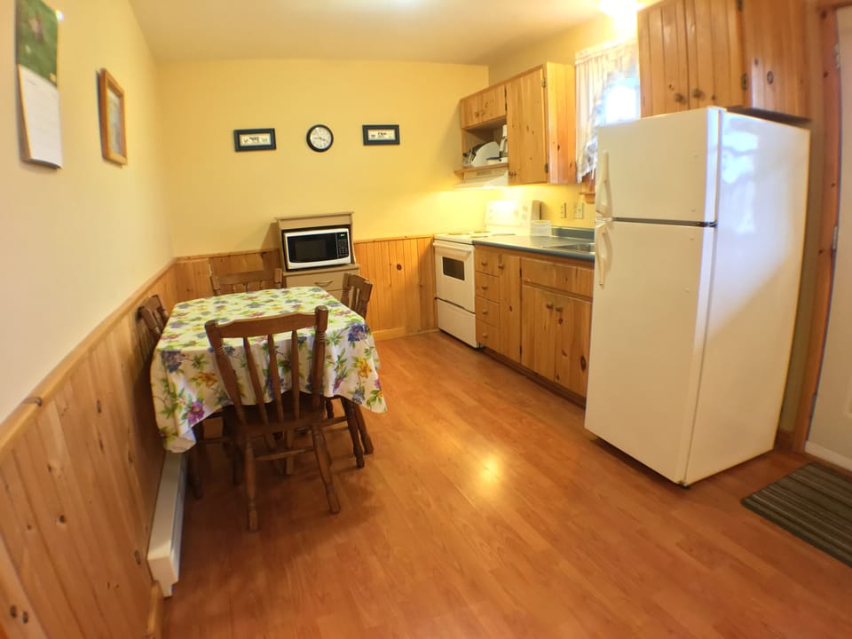 Cottage, 2 Bedrooms, River View | Private kitchen | Full-size fridge, microwave, coffee/tea maker