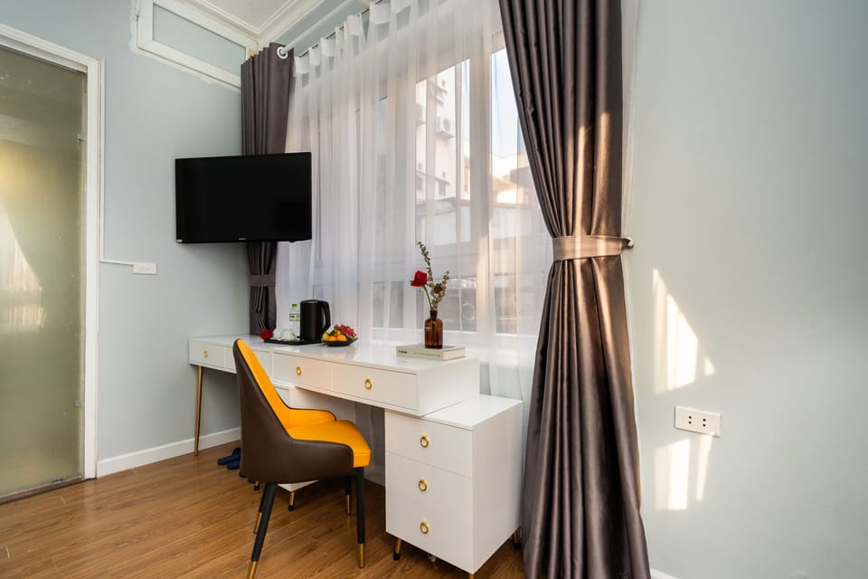 Deluxe Double Room, City View | Minibar, in-room safe, desk, blackout drapes