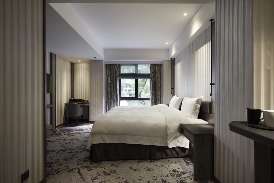 Premium bedding, down comforters, pillowtop beds, in-room safe