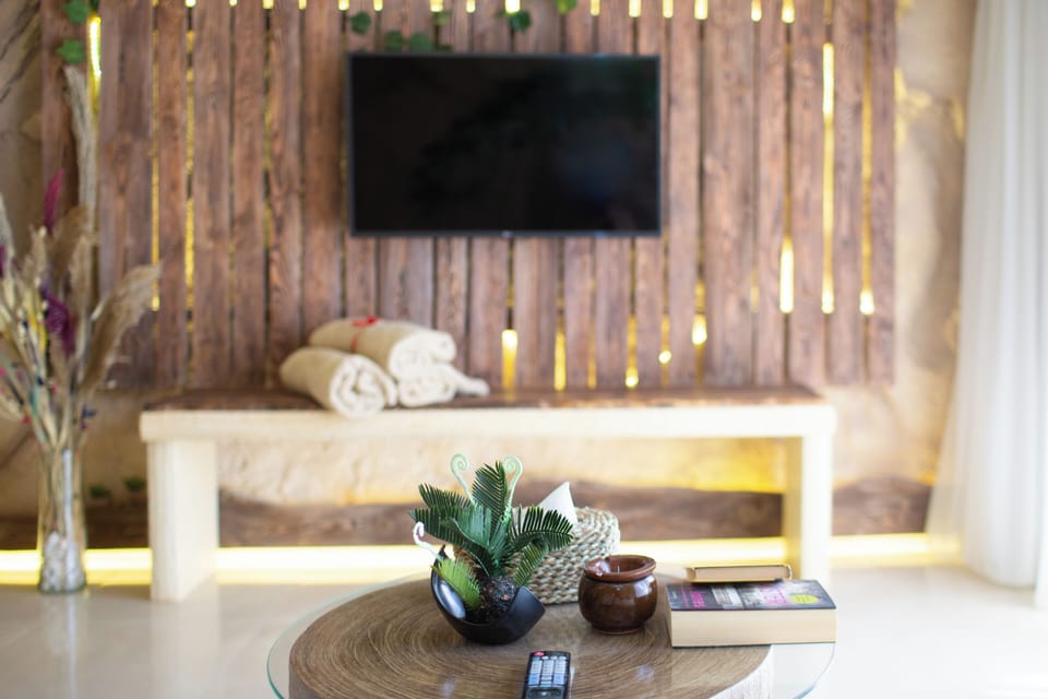 Luxury Double Room, Pool View | Minibar, in-room safe, desk, blackout drapes