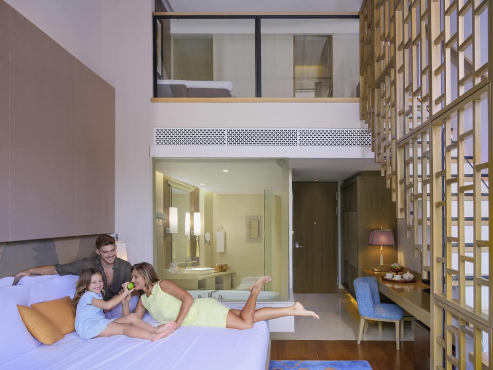Down comforters, pillowtop beds, in-room safe, desk