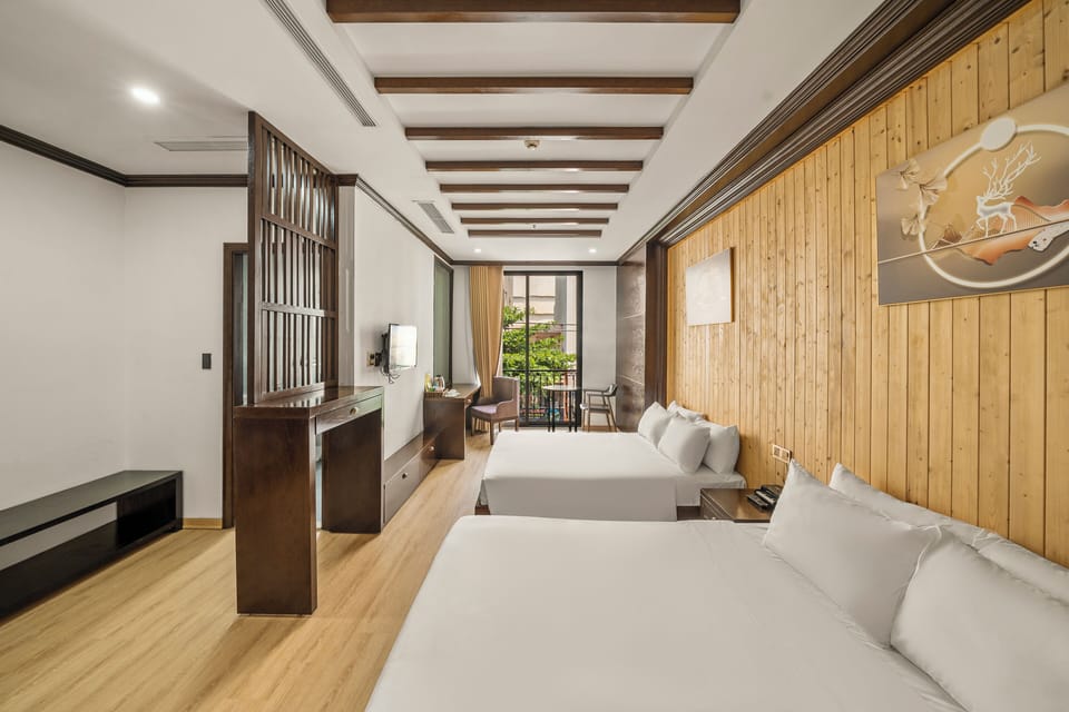 Family Room, 2 Queen Beds, Balcony, City View | Pillowtop beds, minibar, in-room safe, desk