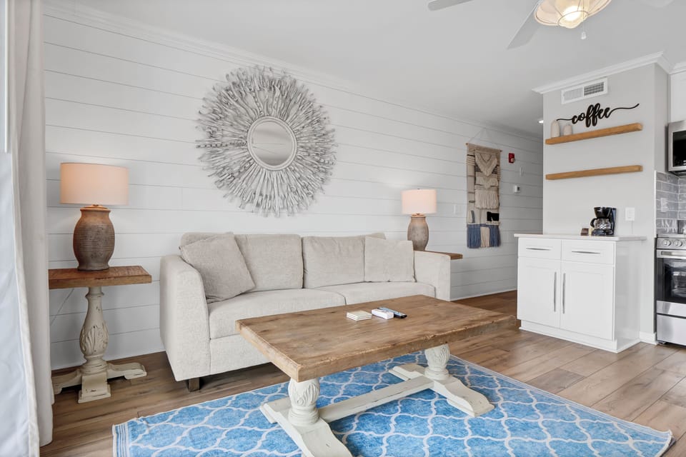 Exclusive Suite, 1 King Bed with Sofa bed, Kitchen, Ocean View | Living area | Flat-screen TV
