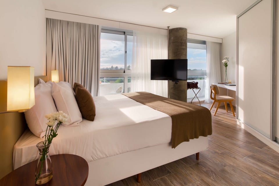 Suite, 1 King Bed, City View | 1 bedroom, in-room safe, desk, blackout drapes