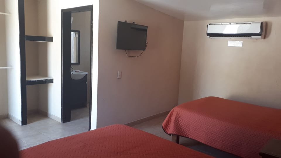 Standard Quadruple Room, 2 Double Beds | Iron/ironing board, free WiFi, bed sheets