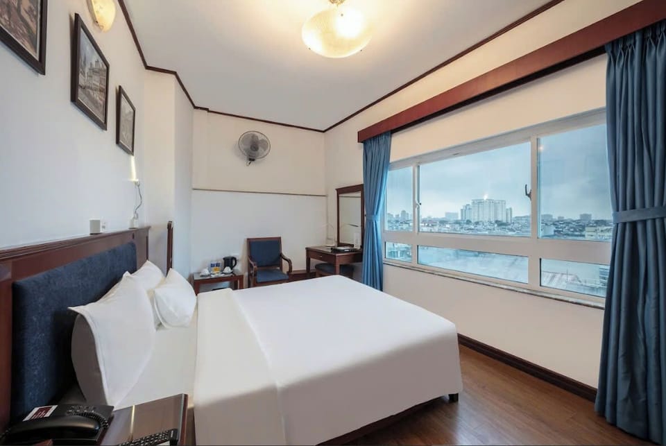Superior Double Room | Minibar, in-room safe, blackout drapes, iron/ironing board