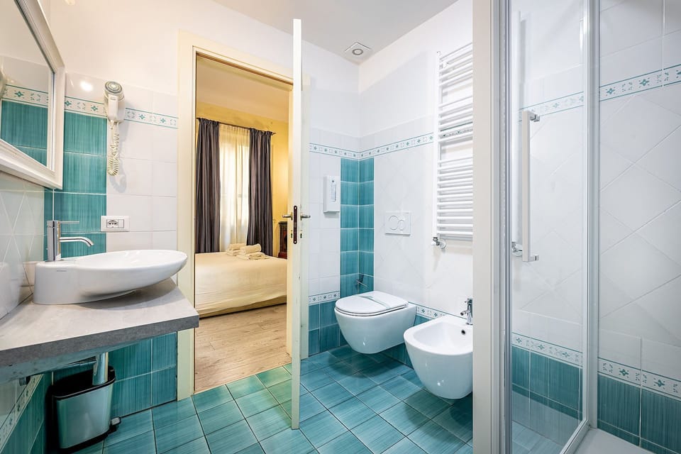 Standard Double Room | Bathroom | Free toiletries, slippers, bidet, towels