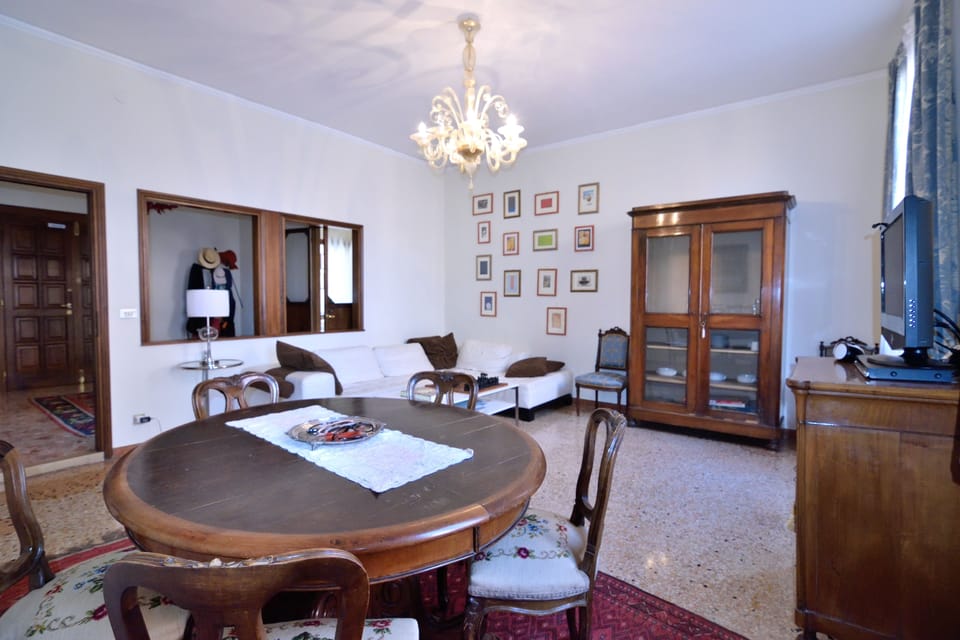 Apartment, 4 Bedrooms | Living area | Flat-screen TV, DVD player