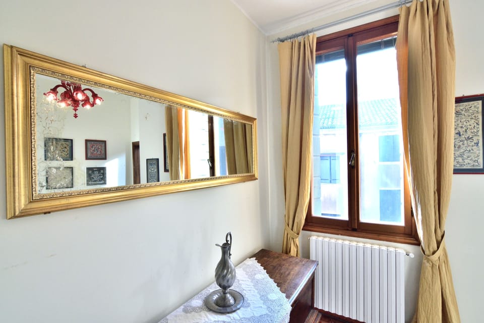 Apartment, 4 Bedrooms | Living room | Flat-screen TV, DVD player