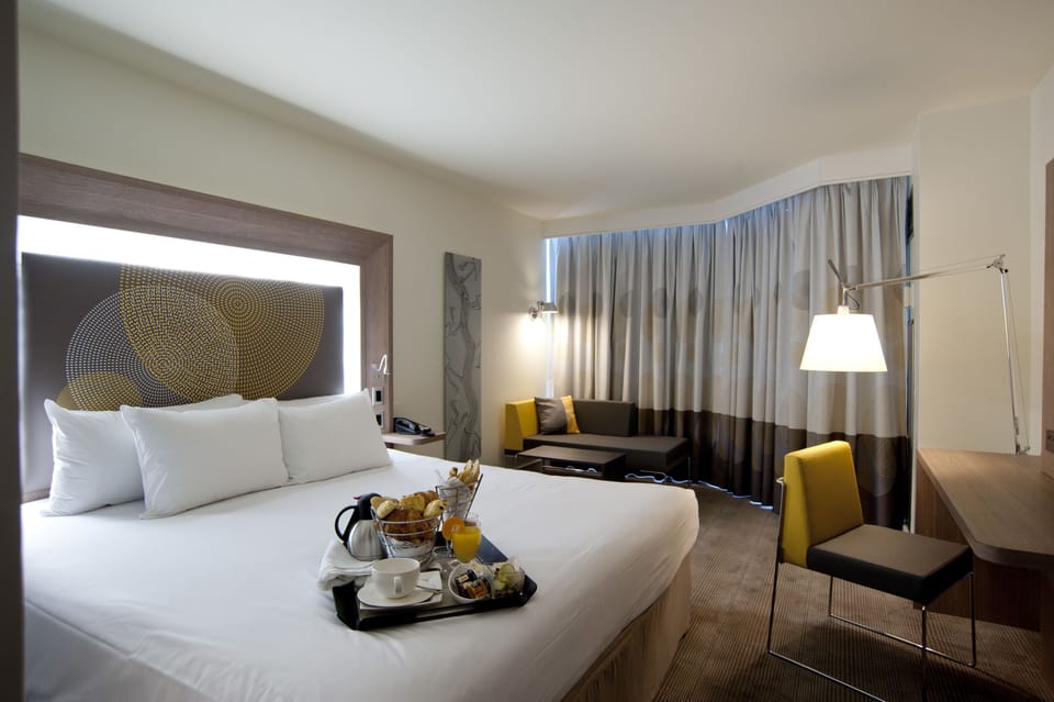 Premium bedding, down comforters, in-room safe, desk