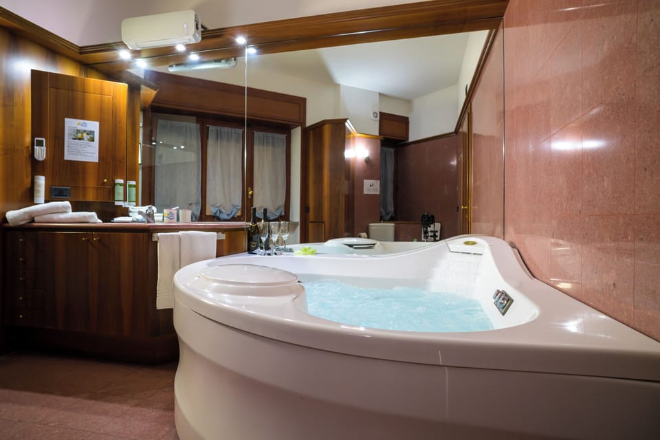 Executive Suite, 1 Bedroom | Bathroom | Eco-friendly toiletries, hair dryer, bathrobes, bidet