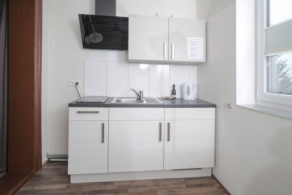 Apartment (B) | Private kitchen | Fridge, coffee/tea maker, electric kettle