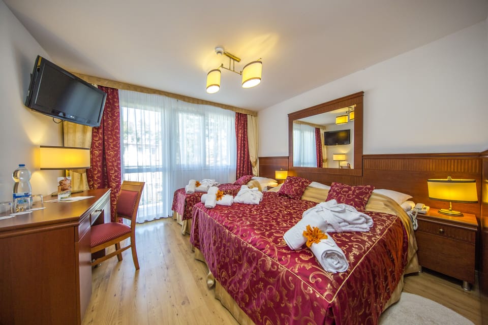 Double Room, Multiple Beds (extra bed) | In-room safe, desk, laptop workspace, cribs/infant beds