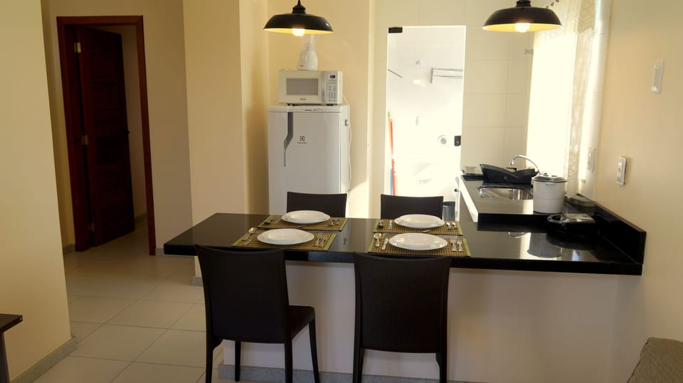 Deluxe Duplex | Private kitchen | Fridge, microwave, oven, blender