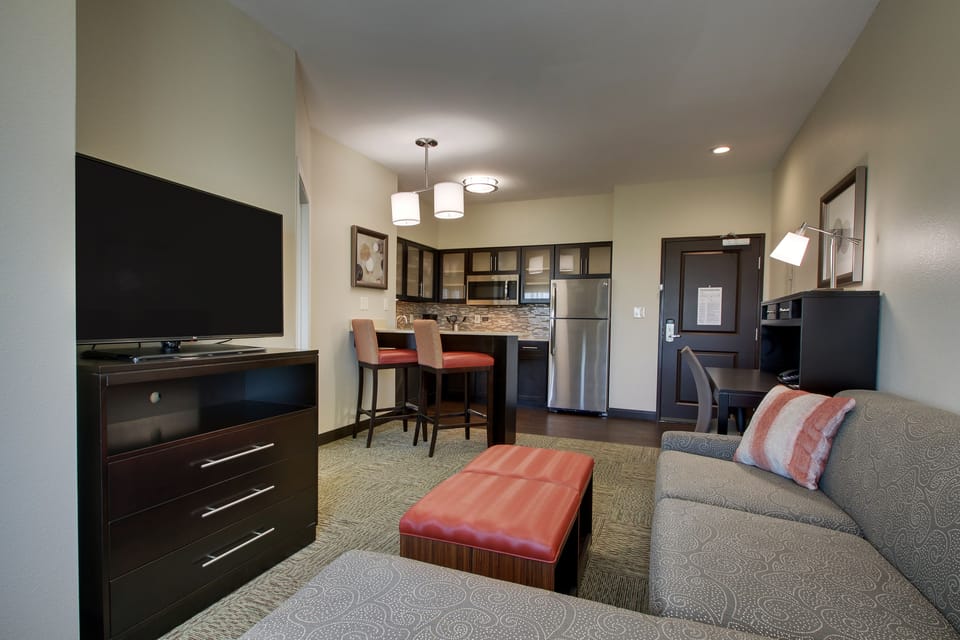 Premium bedding, desk, laptop workspace, soundproofing