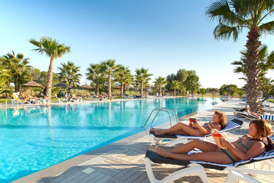 2 indoor pools, 3 outdoor pools, open open 24 hours, pool umbrellas
