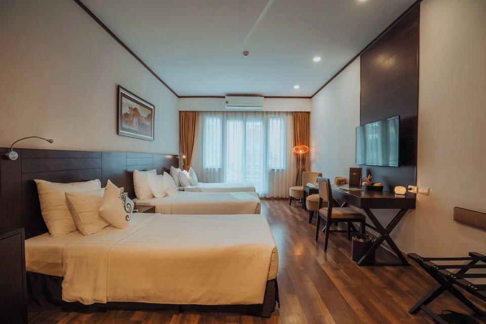 Deluxe Triple Room, 1 Bedroom, City View | 1 bedroom, minibar, in-room safe, desk