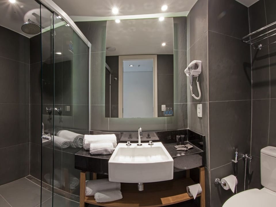 Shower, eco-friendly toiletries, hair dryer, towels