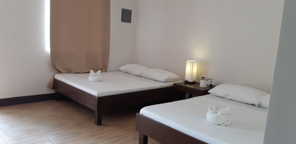 Deluxe Double Room, 2 Double Beds, Partial Sea View | Desk, laptop workspace, free WiFi, bed sheets