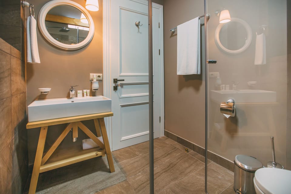 Compact Double or Twin Room, no windows | Bathroom | Shower, free toiletries, slippers, towels