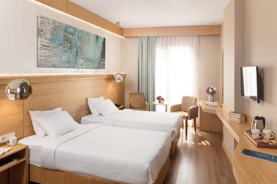 Premium bedding, desk, laptop workspace, soundproofing