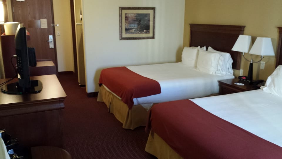 Down comforters, desk, blackout drapes, iron/ironing board