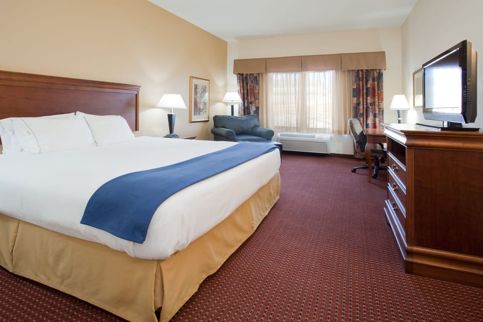Down comforters, desk, blackout drapes, iron/ironing board