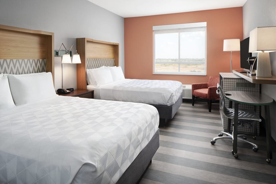 Premium Room, Multiple Beds | In-room safe, desk, blackout drapes, iron/ironing board