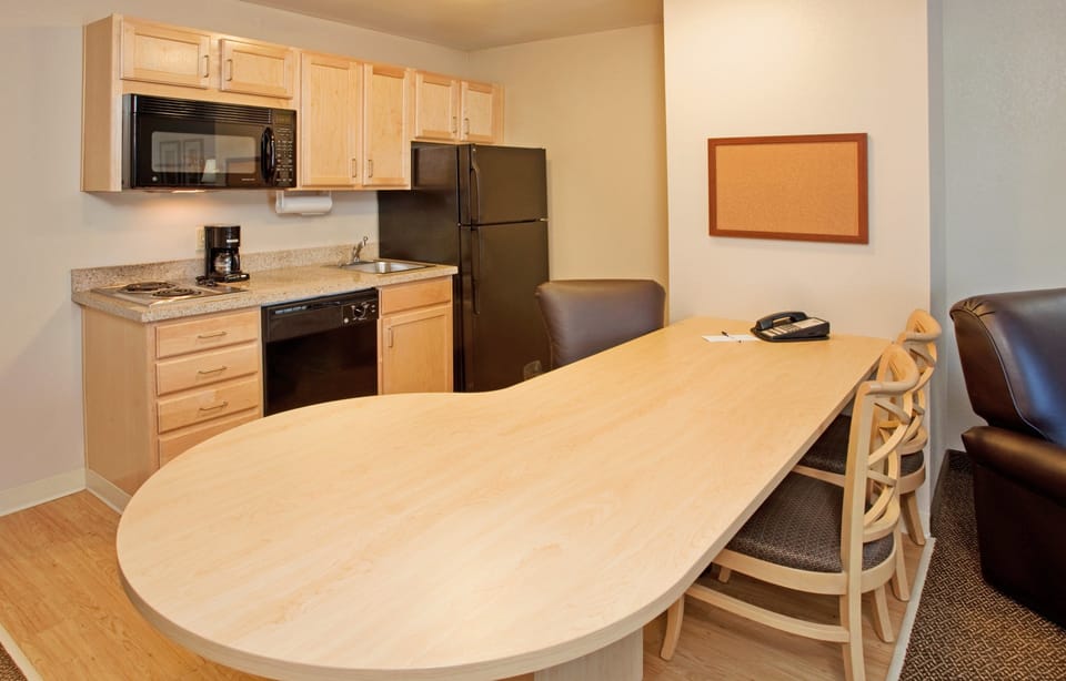 In-room safe, desk, iron/ironing board, cribs (free)