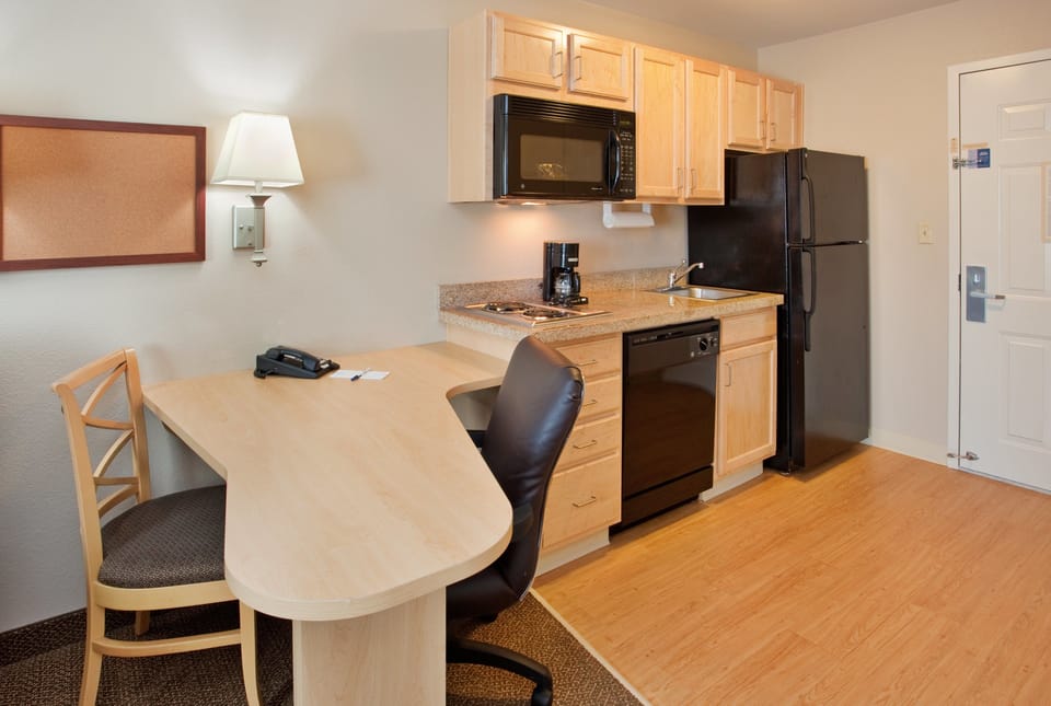 In-room safe, desk, iron/ironing board, cribs (free)