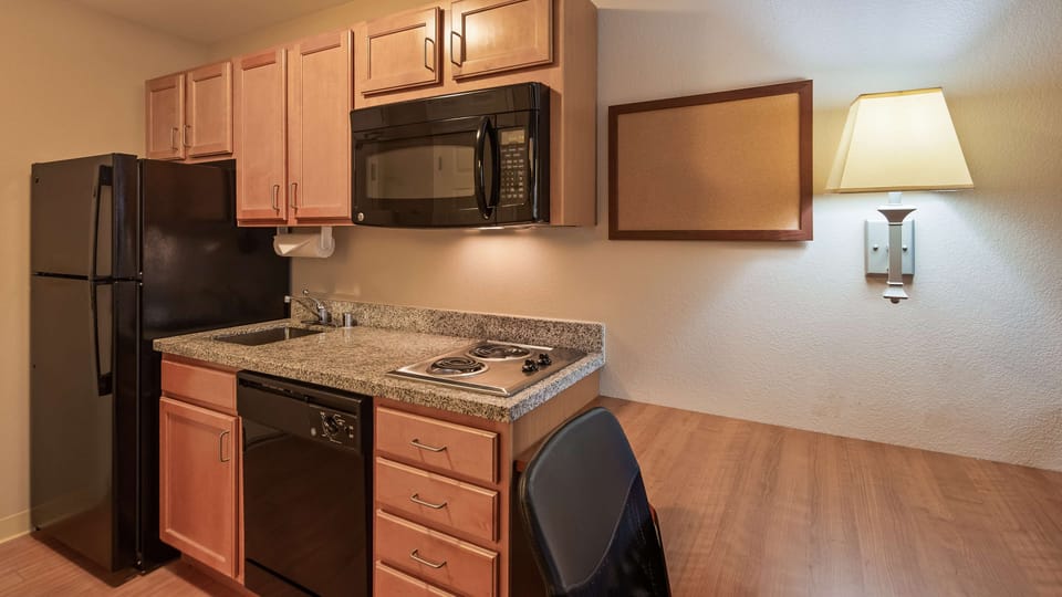 Standard Room, 2 Queen Beds, Non Smoking, Kitchenette | Desk, laptop workspace, blackout drapes, iron/ironing board