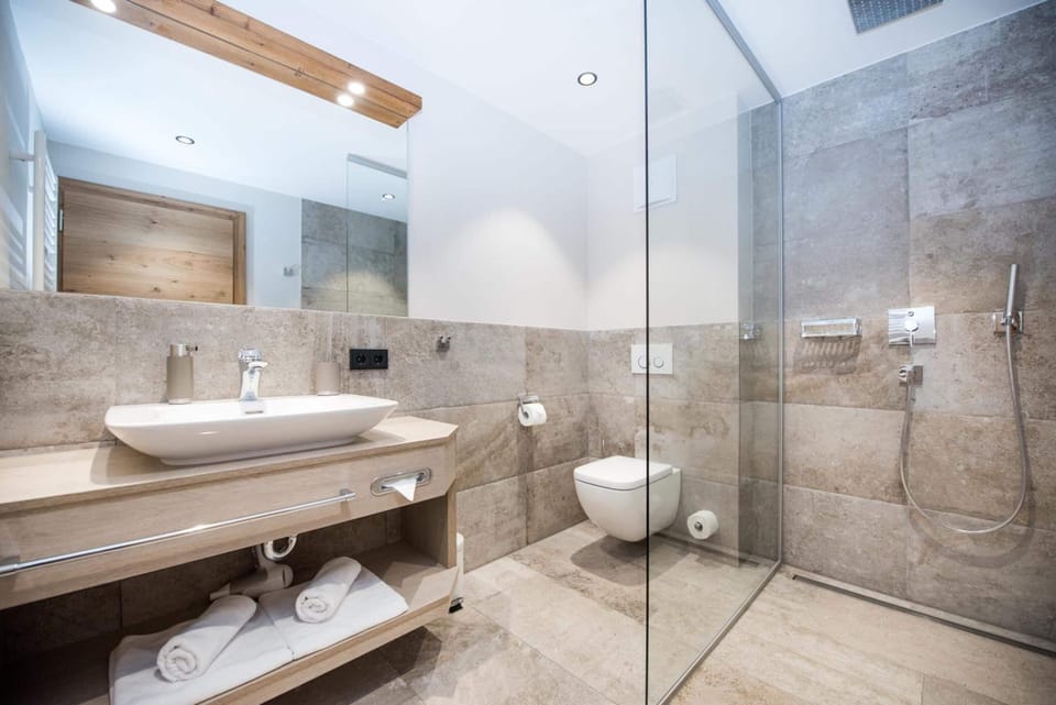 Hair dryer, bathrobes, slippers, towels