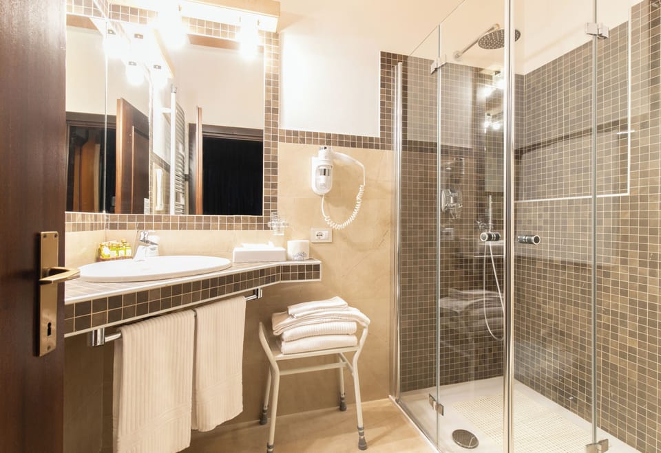 Superior Quadruple Room, Mountain View | Bathroom | Shower, free toiletries, hair dryer, bidet