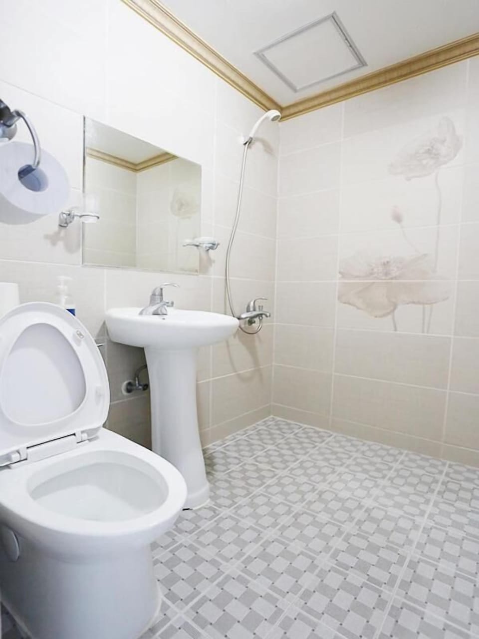 Shower, hair dryer, slippers, towels