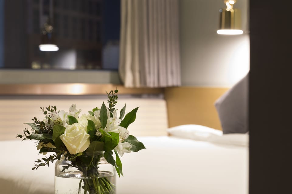 Premium bedding, down comforters, memory foam beds, in-room safe