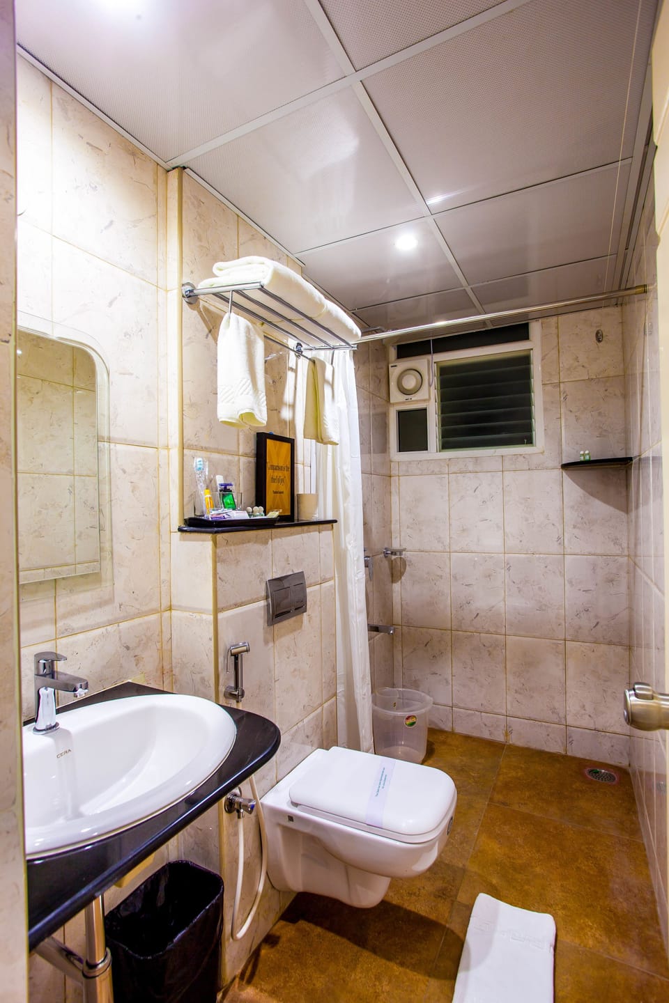Shower, free toiletries, hair dryer, towels