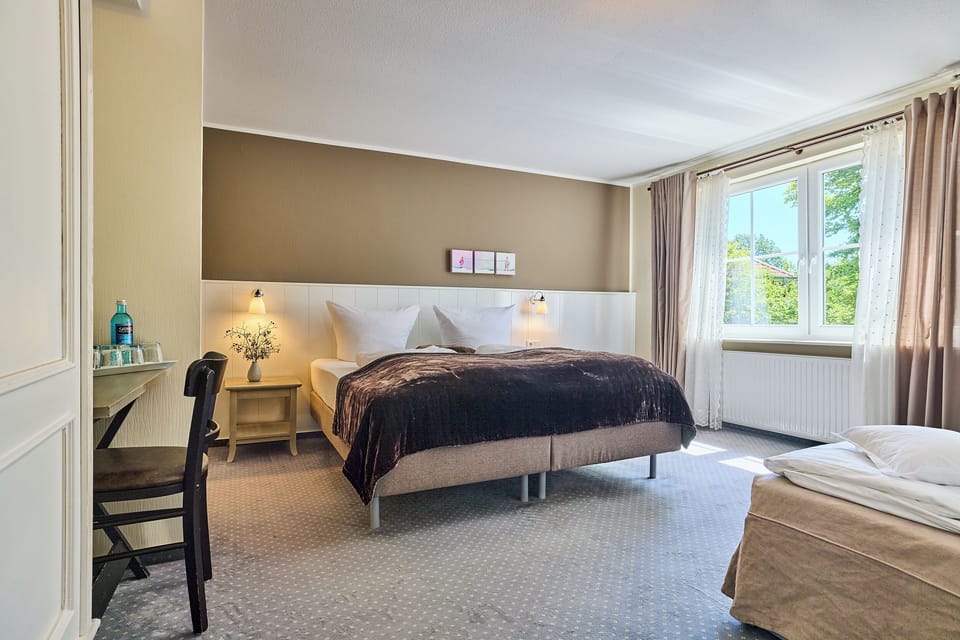 Standard Quadruple Room, 1 Bedroom | Premium bedding, desk, rollaway beds, free WiFi