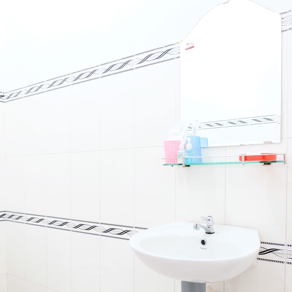 Shower, free toiletries, slippers, towels