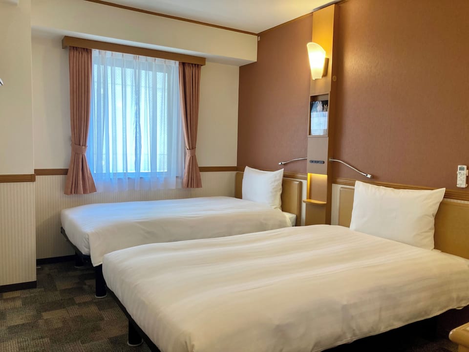 Desk, laptop workspace, free WiFi, bed sheets