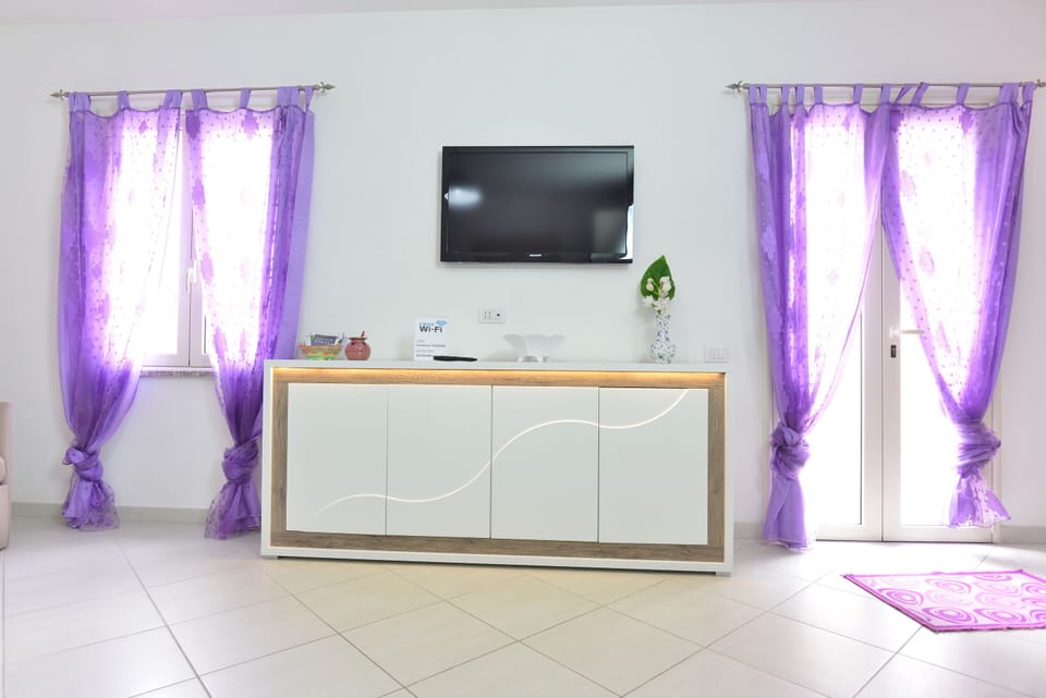 Apartment, 1 Bedroom | Living area | 43-inch flat-screen TV with digital channels, TV