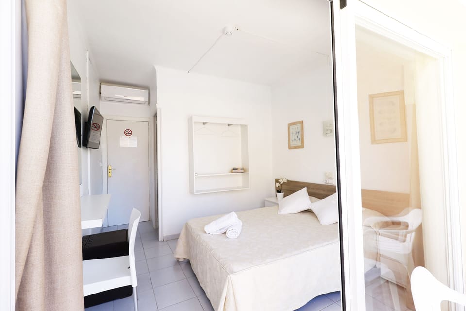 Economy Double Room Single Use, Balcony | Minibar, desk, blackout drapes, WiFi (free)