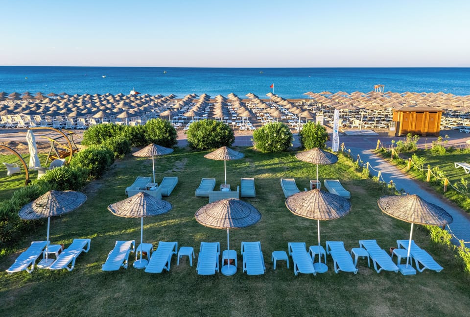 Private beach, free beach shuttle, sun loungers, beach umbrellas