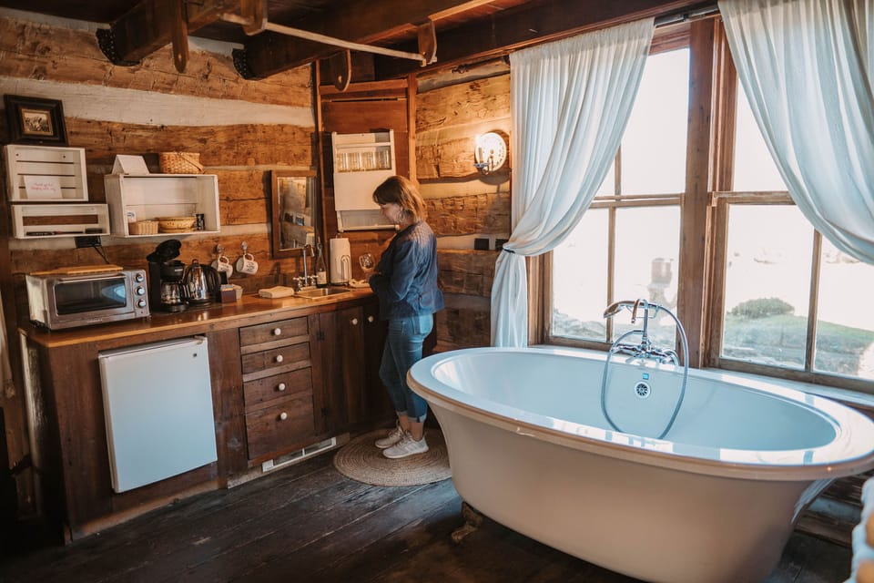Deluxe Cottage, 1 King Bed | Private kitchen | Coffee/tea maker, shared fridge, shared microwave, paper towels