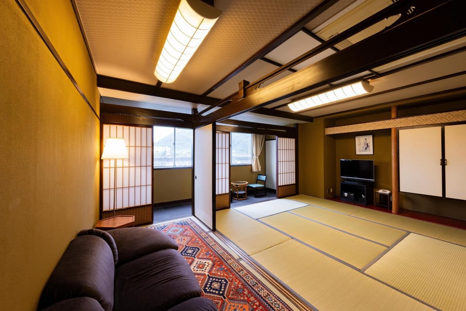 Japanese Room with Toilet and Bath (8+4 Tatami Mats for 4 People), Non Smoking | Down comforters, in-room safe, desk, free WiFi