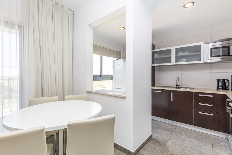 Apartment, 1 Bedroom | Private kitchenette | Fridge, microwave, stovetop, electric kettle